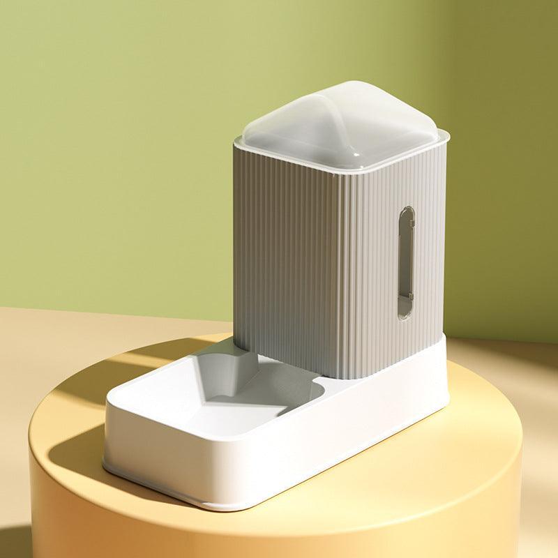 Modern dog water fountain on a gold stand with a green background