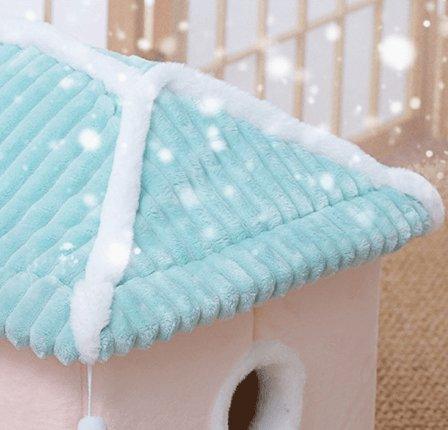 Cat tree with a turquoise roof and white trim