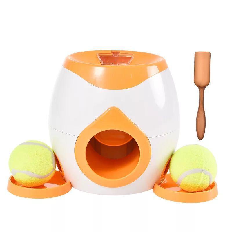 Pet toy with tennis balls and a wooden paddle on a white background