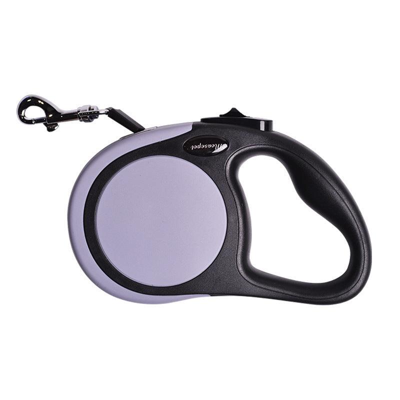 Retractable dog leash with gray reel and black handle on a white background