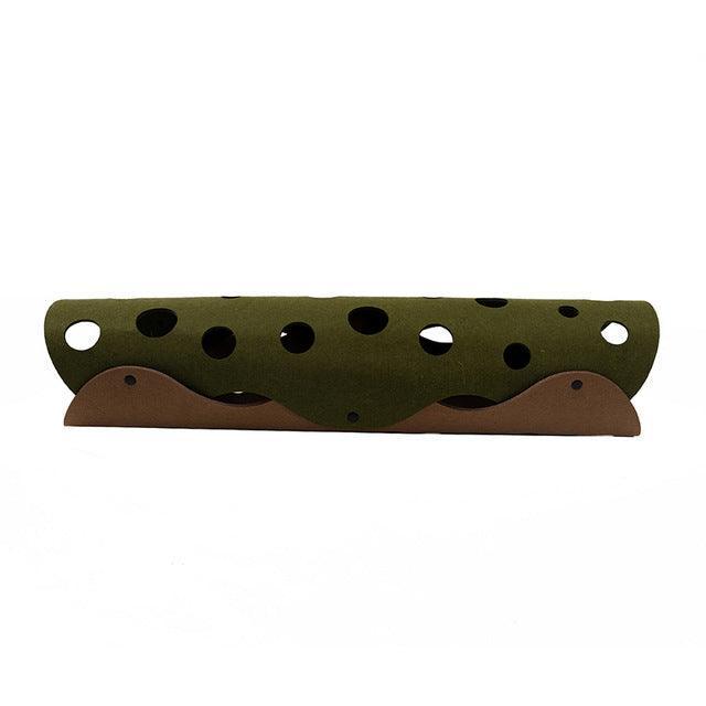 Green and brown guitar neck with multiple holes on a white background