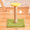 Cat tree with green base, yellow top, and measurements on a wooden floor.