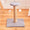 Cat tree with dimensions on a wooden floor