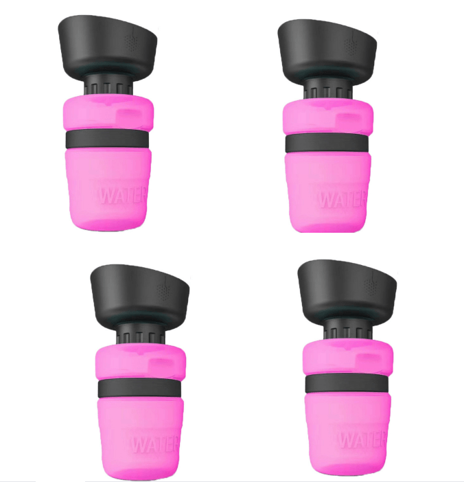 Four pink water bottle nozzles with black caps on a white background