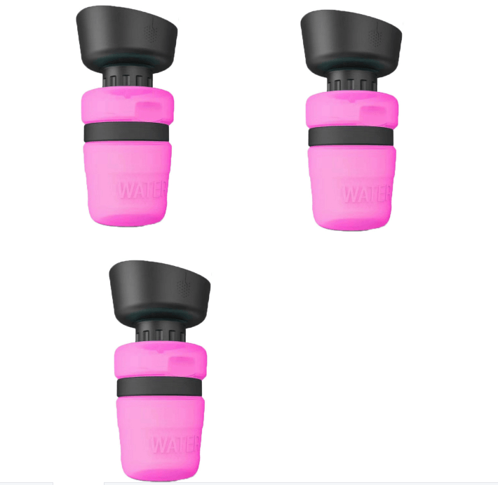 Three pink and black water bottle nozzles on a white background