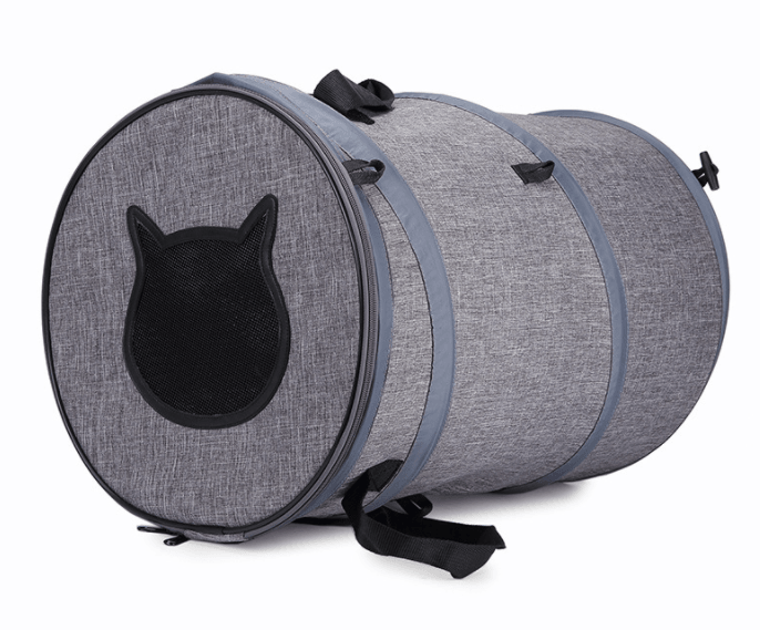 Gray pet carrier with black cat face design on a white background
