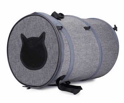 Gray pet carrier with black cat face design on a white background