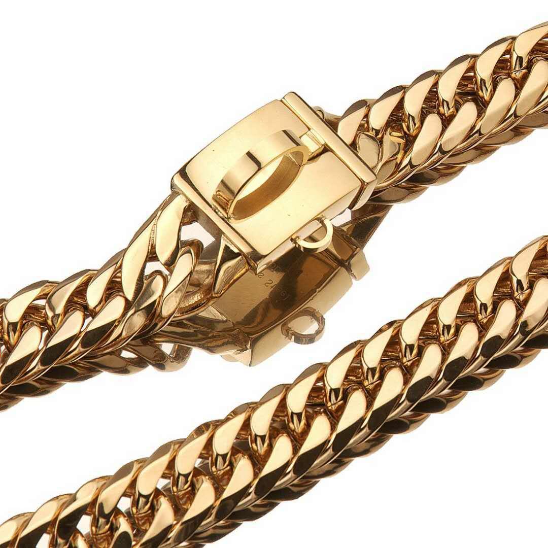 Gold chain bracelet with a clasp on a white background