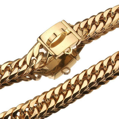 Gold chain bracelet with a clasp on a white background