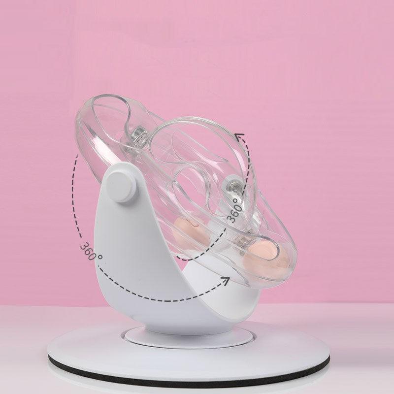 White sandal with clear ankle support on a pink background
