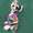 Dog wearing a colorful striped sweater on a green background