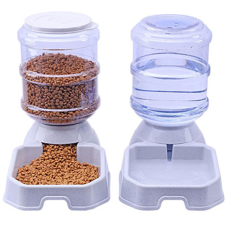 Pet food dispenser and water bottle set on a white background