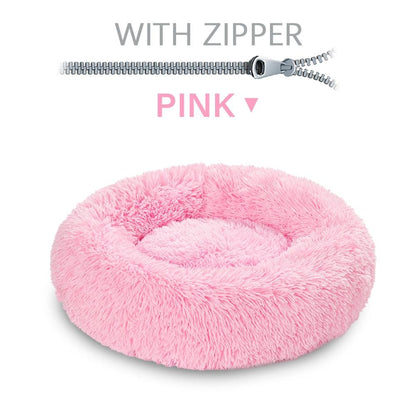 Pink fluffy pet bed with a zipper on a white background