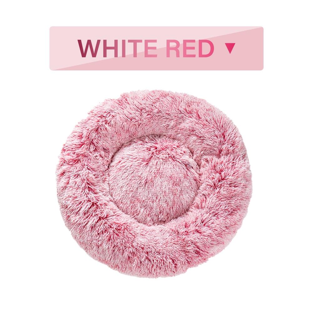 Pink fluffy pet bed with 'White Red' label on a white background