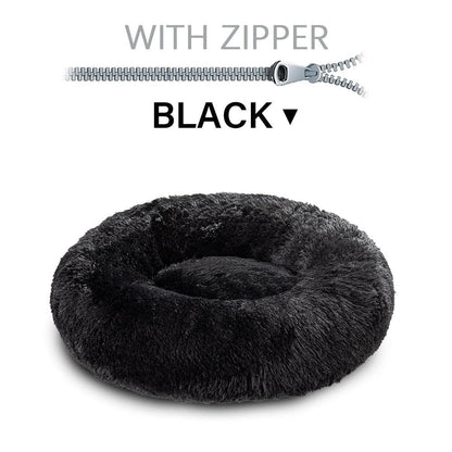 Black fluffy pet bed with a zipper on a white background