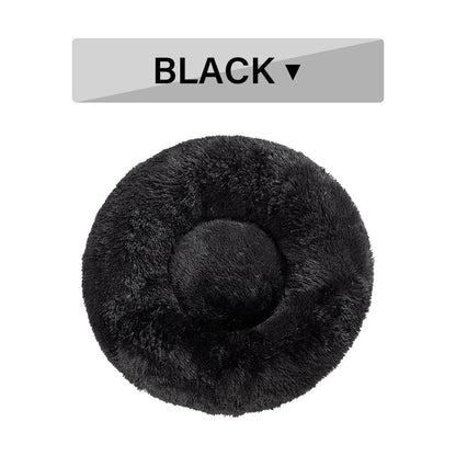 Black fluffy donut-shaped pet bed on a white background with a 'BLACK' label above it.