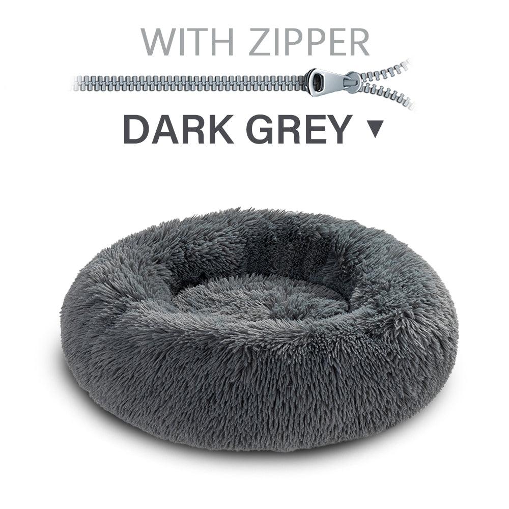 Dark grey fluffy pet bed with a zipper on a white background