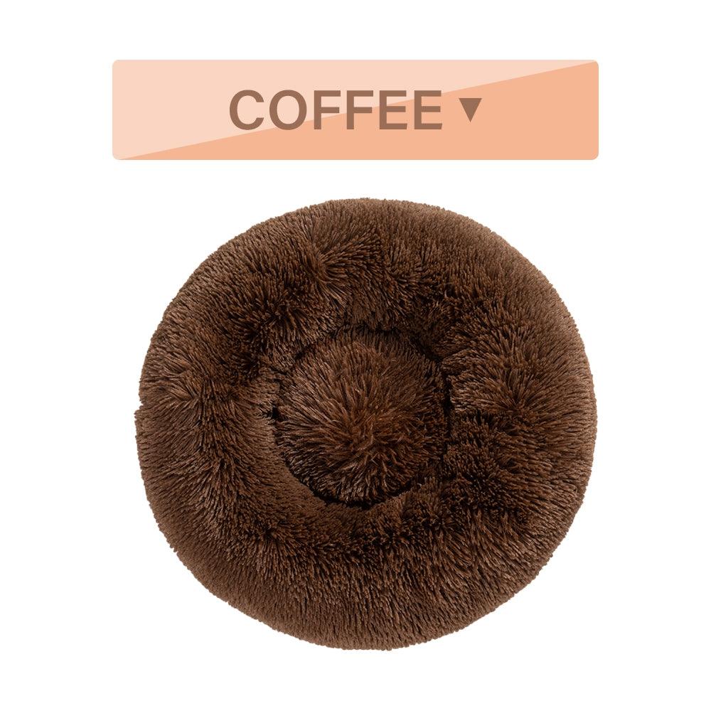 Brown fluffy donut-shaped pet bed with a 'Coffee' label above it on a white background