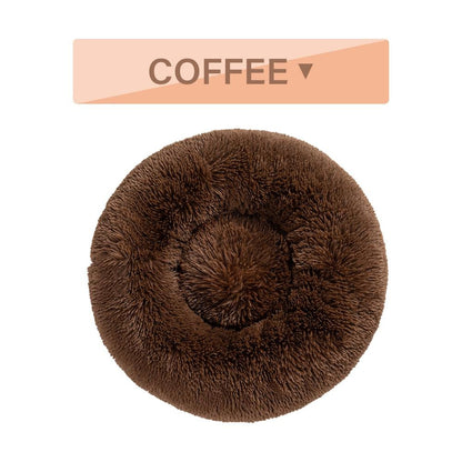 Brown fluffy donut-shaped pet bed with a 'Coffee' label above it on a white background