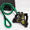 Dog harness and green and black rope leash on a white background