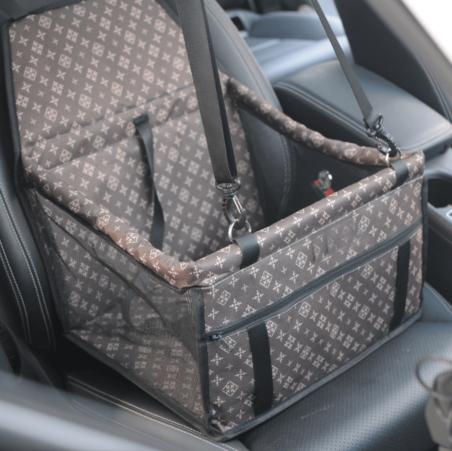 Patterned pet car seat cover on a car seat