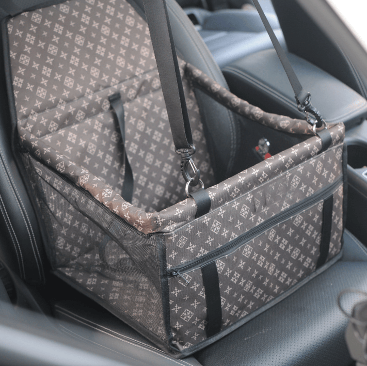 Patterned pet car seat cover on a car seat
