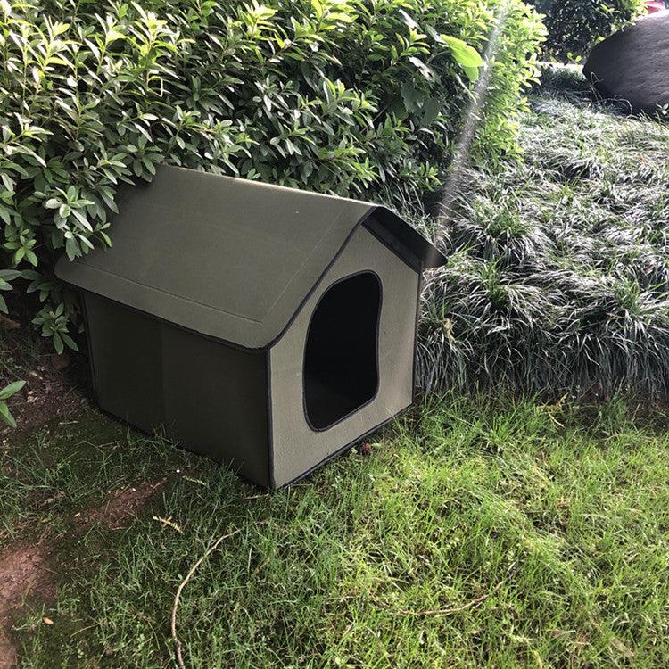 Outdoor pet house on grass with greenery in the background