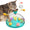 Cat playing with a colorful interactive pet toy
