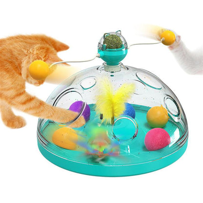 Cat playing with a colorful interactive toy