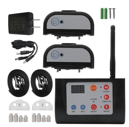 Collection of electronic components including a power adapter, control panel, and various cables on a white background.